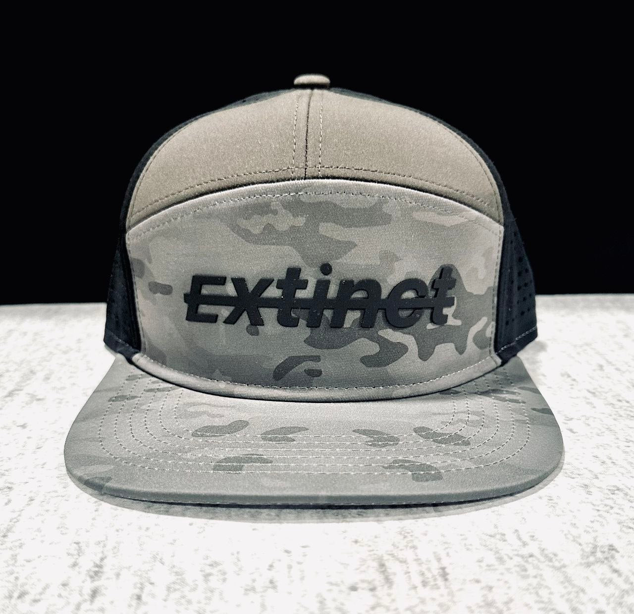 ExtinctMALE camo hat — front view, grey camo with black Extinct branding