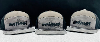 ExtinctMALE camo hat — three-hat lineup